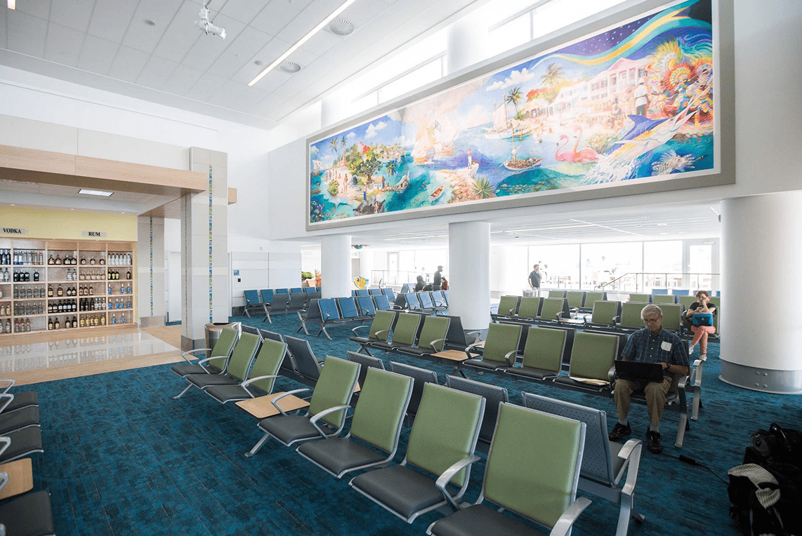 LPIA Domestic arrivals and departures with mural in the background.