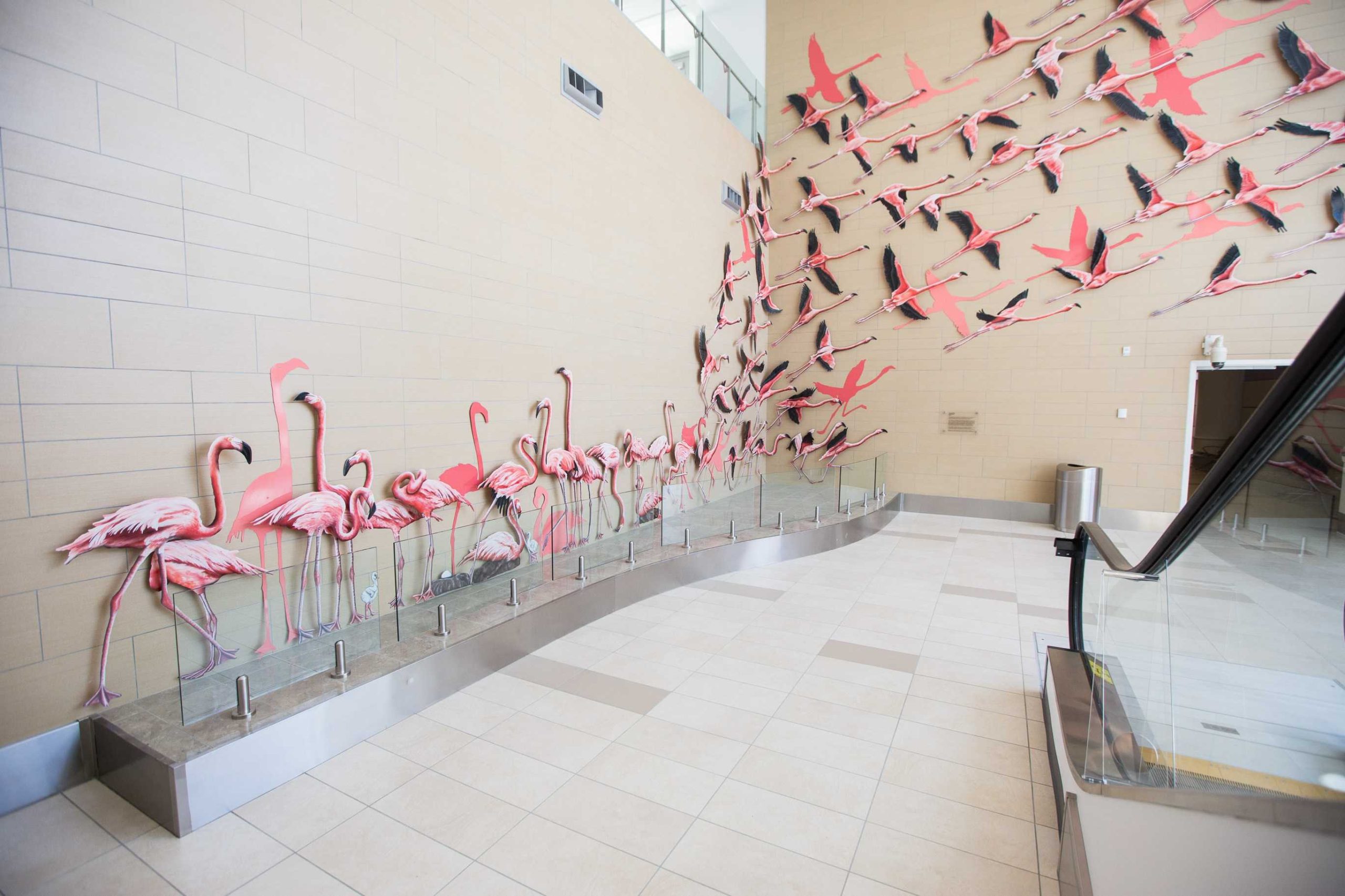 Flamingo art around staircase