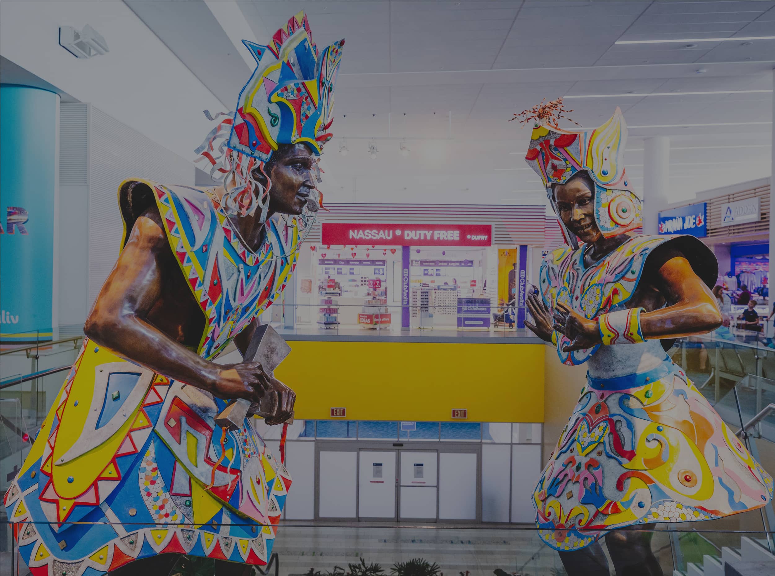 Two statues inside the LPIA airport.